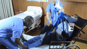 Transfer from Bed to Wheelchair using Repositioning Sling and Ceiling Lift